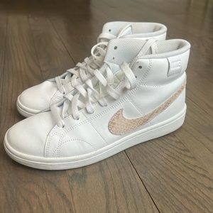 Nike Women’s white and snake print sneakers